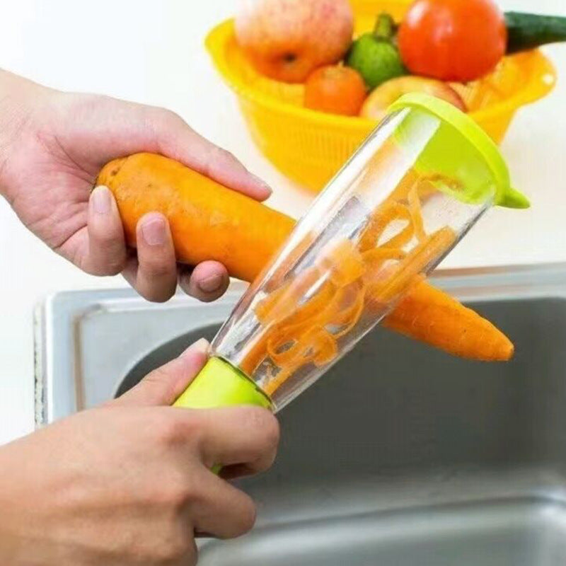 Hand using the Multifunctional Storage Box Peeler to peel a carrot, demonstrating the non-slip handle