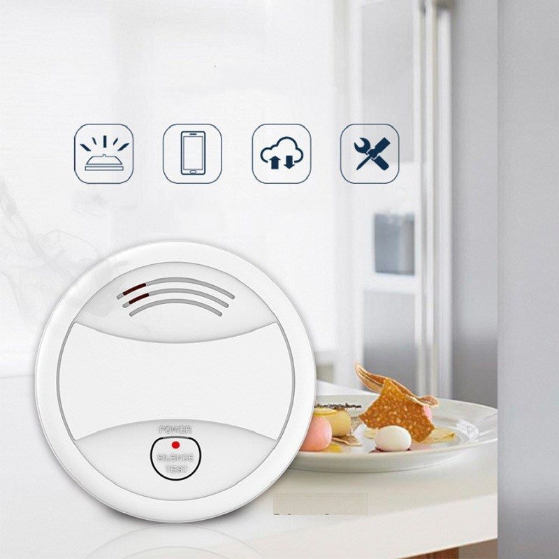 White, round WiFi Household Smoke Sensor with a visible LED indicator