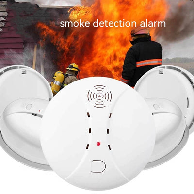 White, round Independent Smoke Alarm with a visible test button.